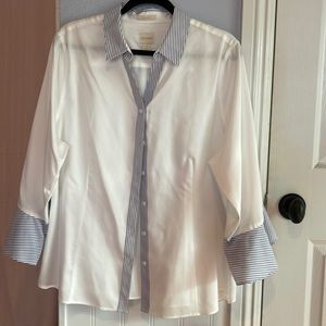 Chico’s white collared shirt with blue striped trim.